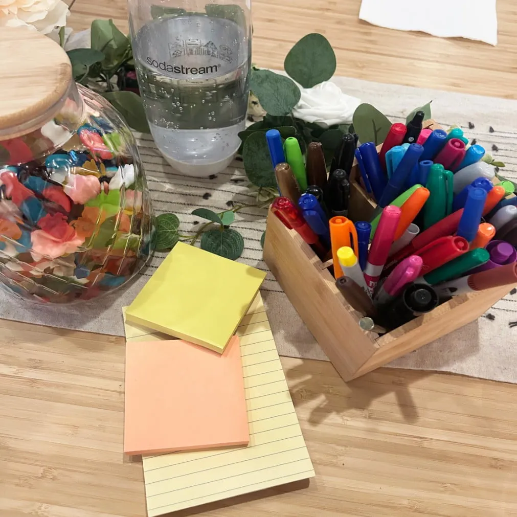 Suzy Rounce sitting working on her laptop